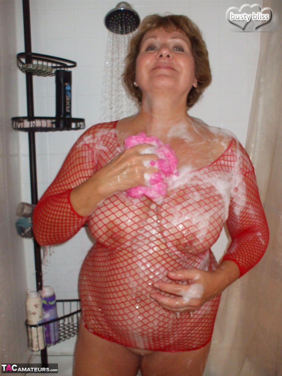 Older Woman Busty Bliss Soaps Up Her Breasts Before Having Her Pussy Licked