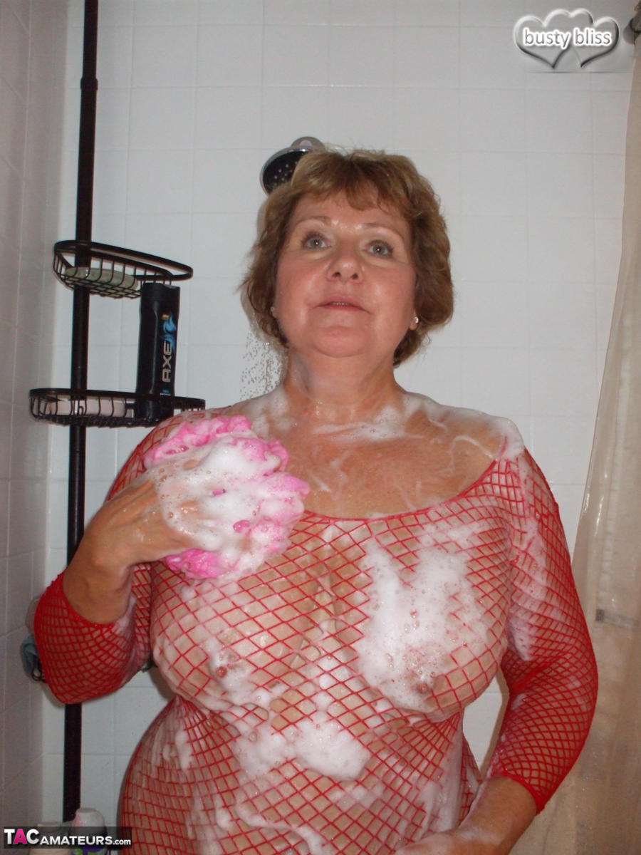 Older Woman Busty Bliss Soaps Up Her Breasts Before Having Her Pussy Licked