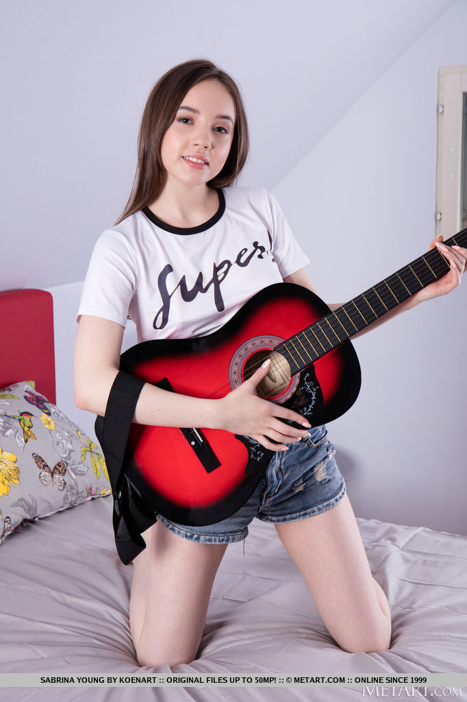 Sweet teen Sabrina Young strums an acoustic guitar before getting bare naked 포르노 사진 #427748725