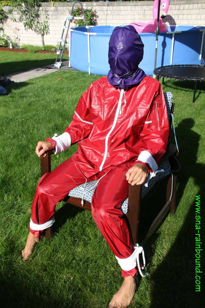 Amateur chick is subjected to breath play while affixed to a chair in a yard porn photo #424873834