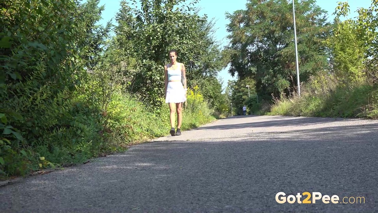Ali Bordeaux stands and pees on a road porn photo #426350491