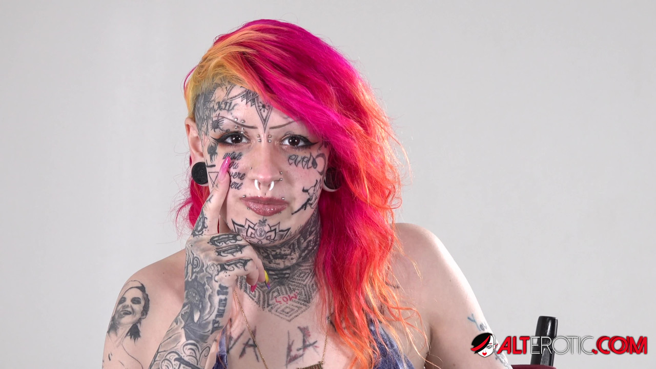 Solo girl with dyed hair Mami displays her heavily tattooed body in a bikini porno fotoğrafı #424049759