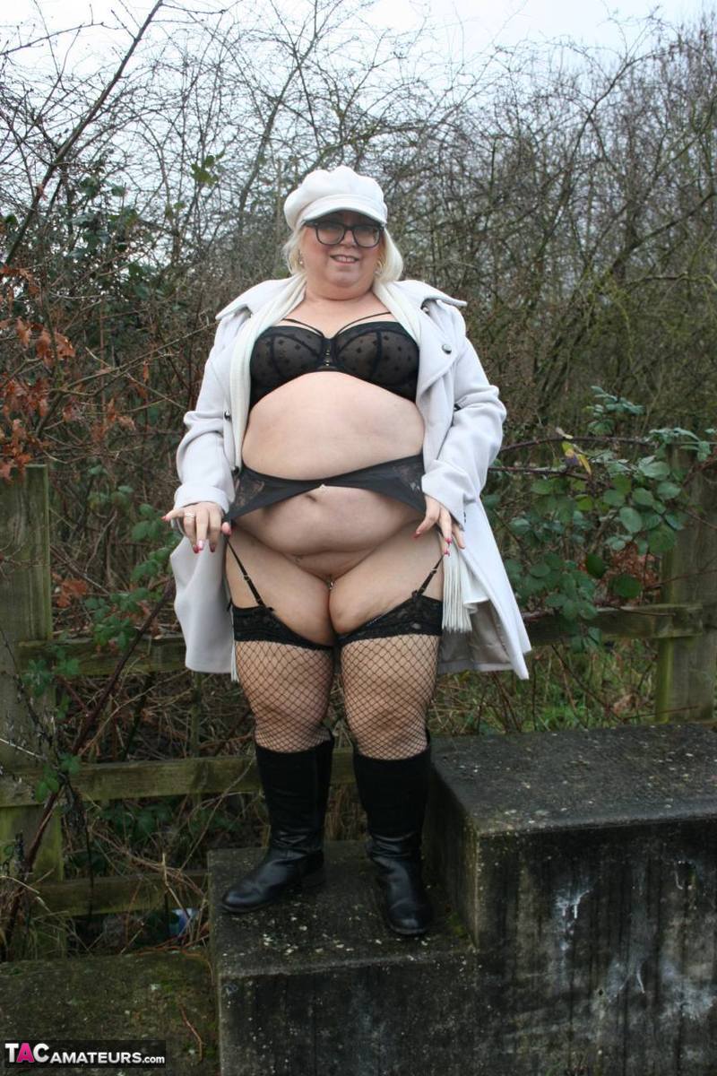 Fat British woman Lexie Cummings exposes herself on a pedestrian bridge porn photo #422786983