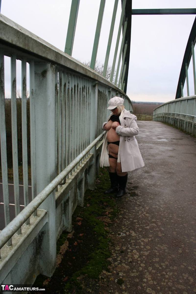 Fat British woman Lexie Cummings exposes herself on a pedestrian bridge porn photo #422786991