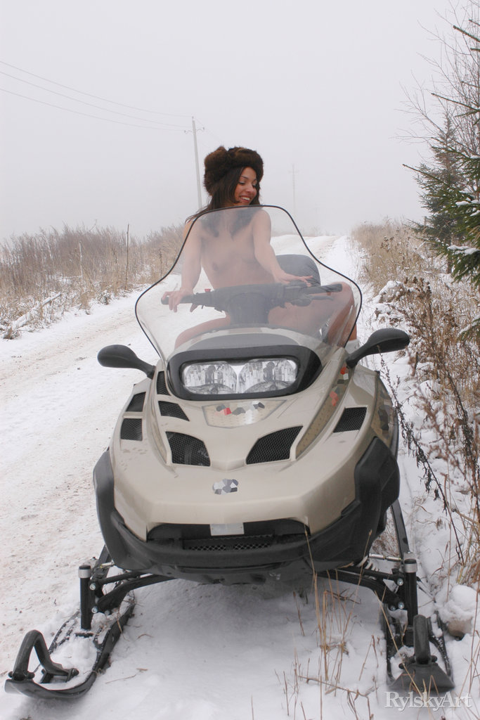 Young brunette Lilian poses in the nude on top of a snowmobile in the winter zdjęcie porno #426962308