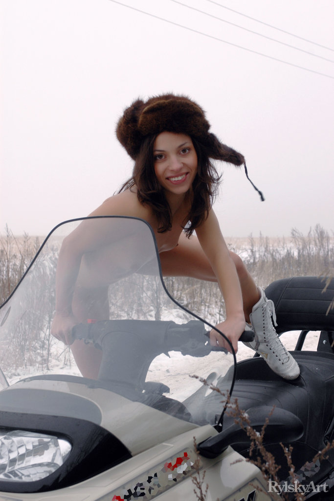 Young brunette Lilian poses in the nude on top of a snowmobile in the winter zdjęcie porno #426620968