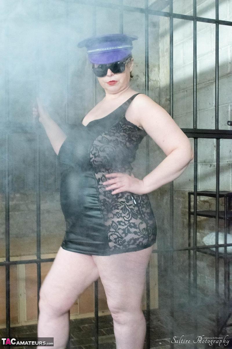 British Fatty Posh Sophia Models Fetish Wear In And Out Of A Jail Cell
