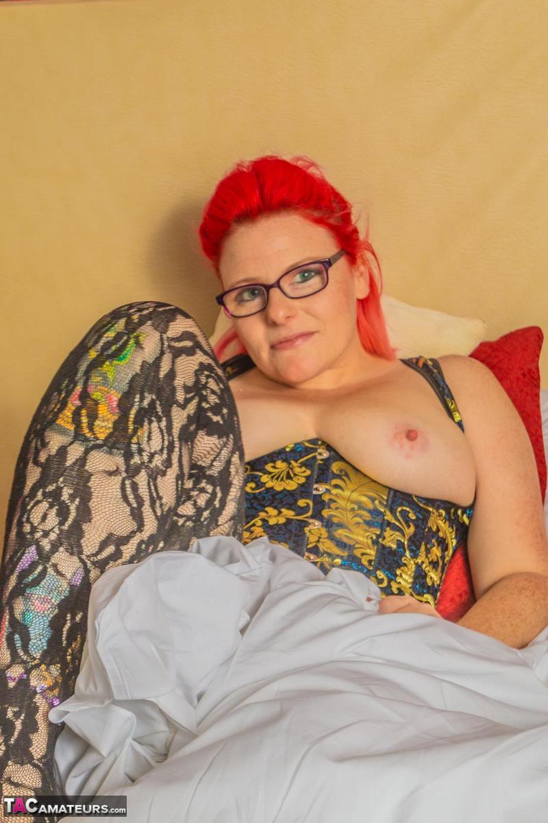 Amateur woman sports dyed hair and glasses while exposing her pierced pussy foto porno #425561285