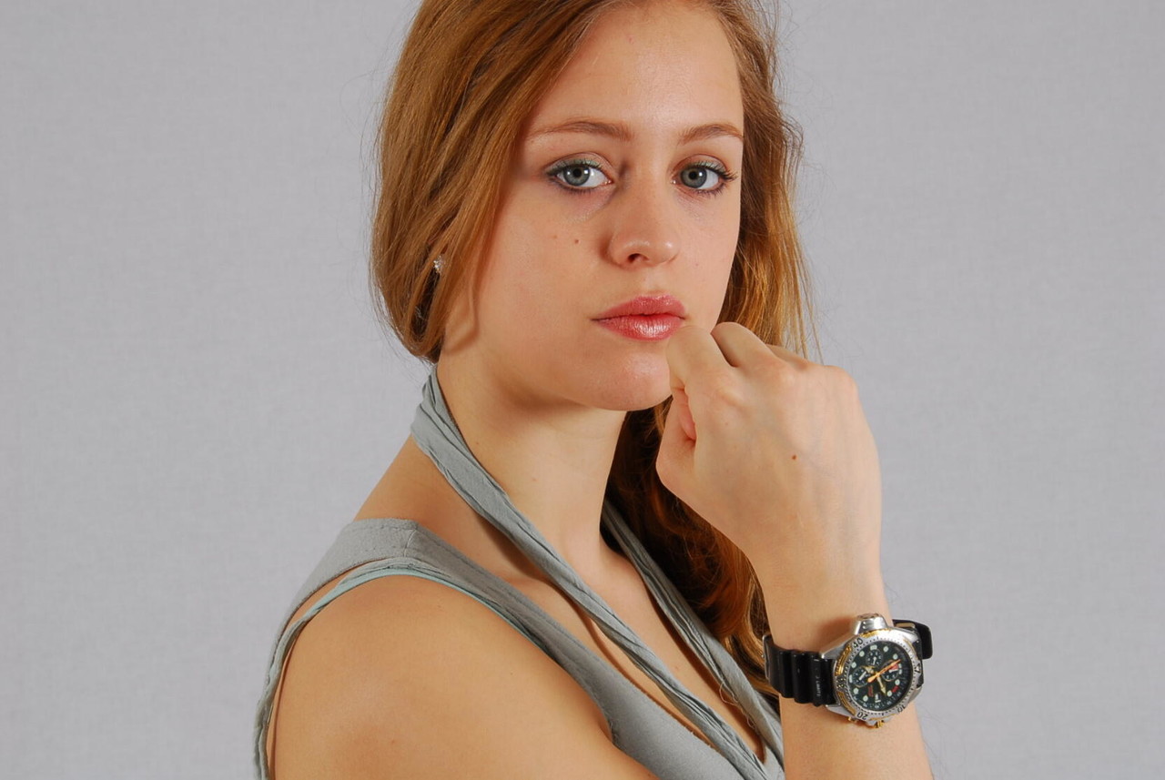 Pretty redhead Jennifer displays her Citizen diver's watch while fully clothed photo porno #425552625
