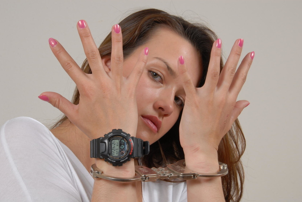 Amateur model sports a pair of handcuffs while wearing a G-Shock watch foto porno #423662254