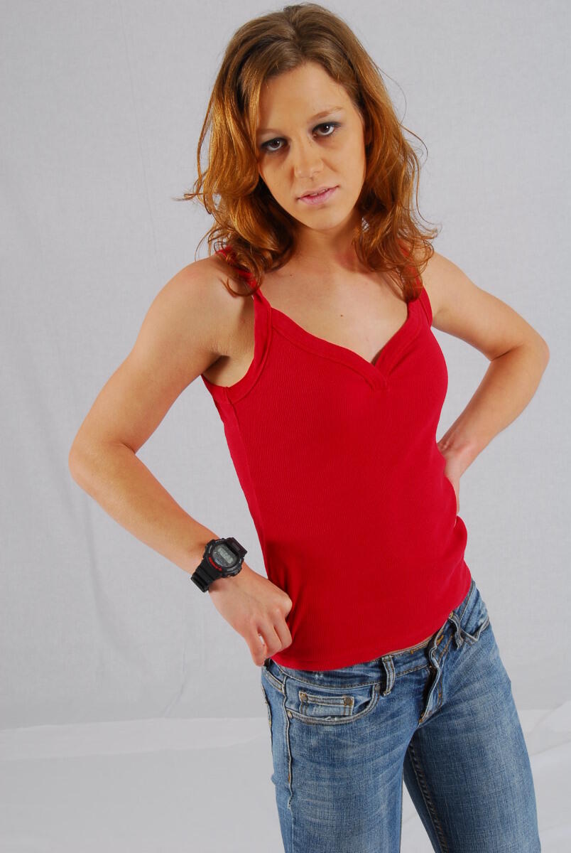Natural redhead Sabine shows off her black G-shock watch while fully clothed porn photo #428536398