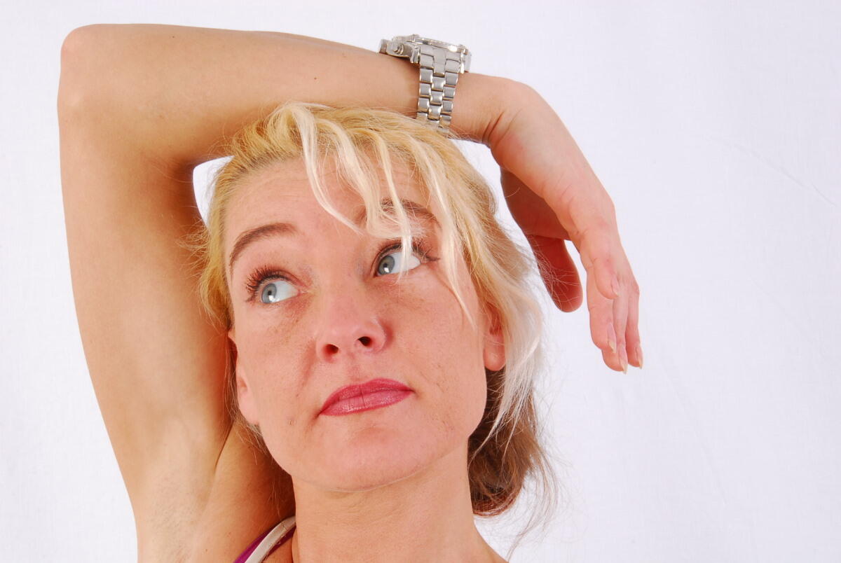 Blue-eyed blonde Lilly models a huge metal watch during safe for work action porn photo #426005011