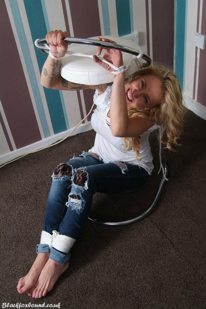 Fully clothed blonde Katie C struggles while restrained with rope bindings porn photo #424873215