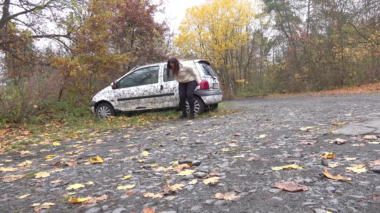 White girl Nicolette Noir takes a piss beside a parked car in a wooded setting zdjęcie porno #427213959