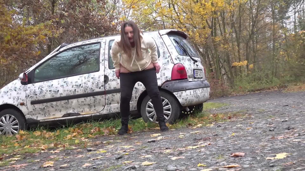White girl Nicolette Noir takes a piss beside a parked car in a wooded setting porno fotoğrafı #427214044