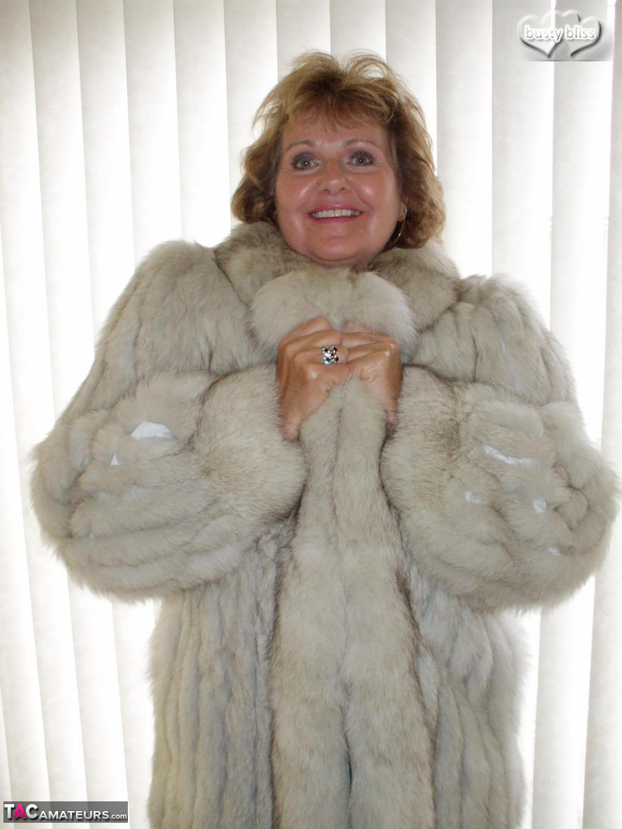 Solo granny Busty Bliss looses her tan lined tits from a fur coat porn photo #428156571