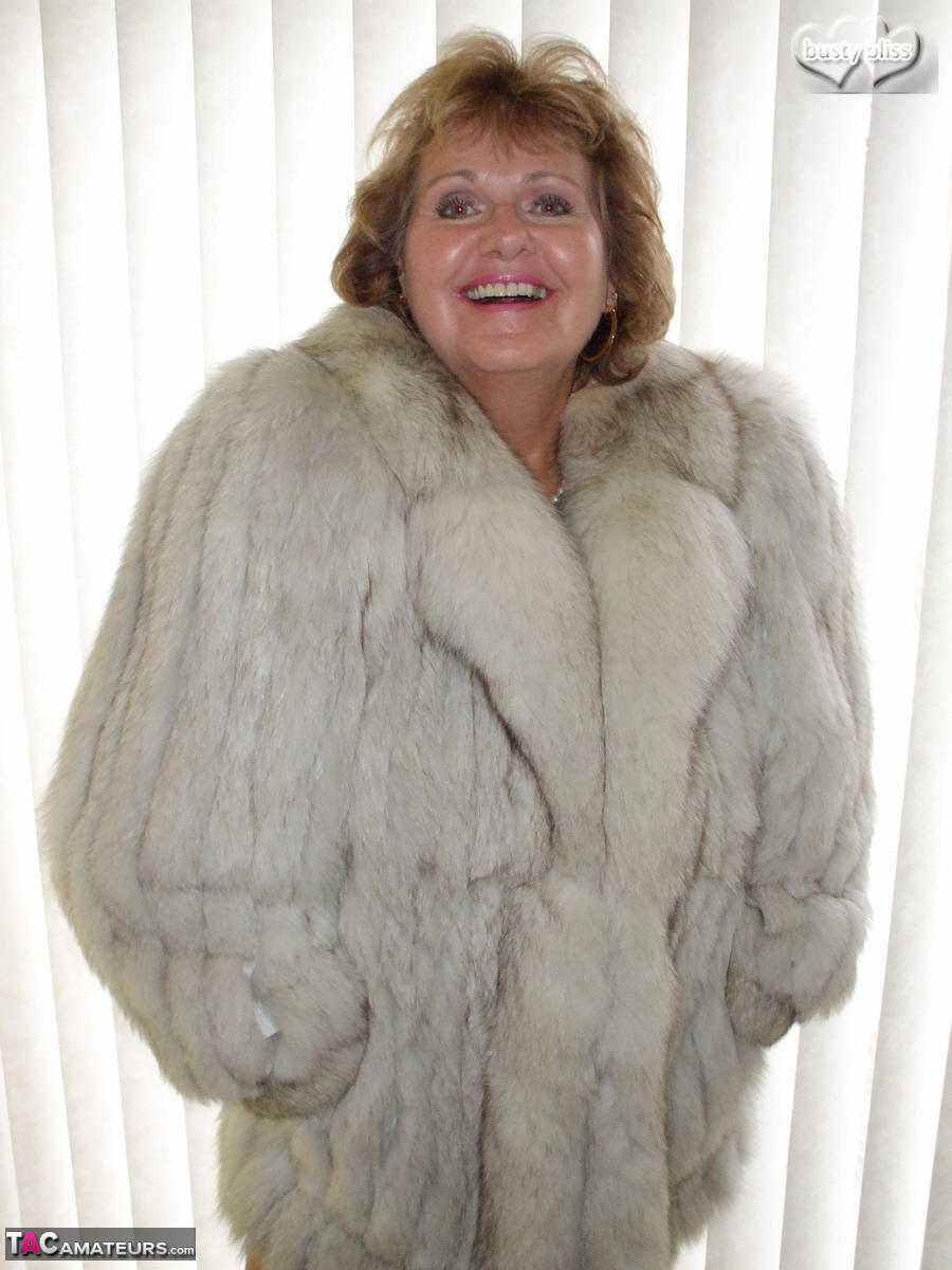 Solo granny Busty Bliss looses her tan lined tits from a fur coat porn photo #428156573