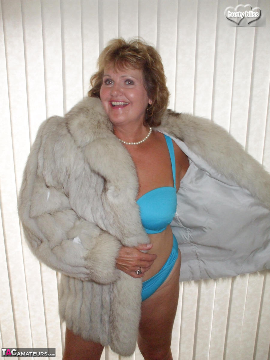 Solo granny Busty Bliss looses her tan lined tits from a fur coat porn photo #428019017