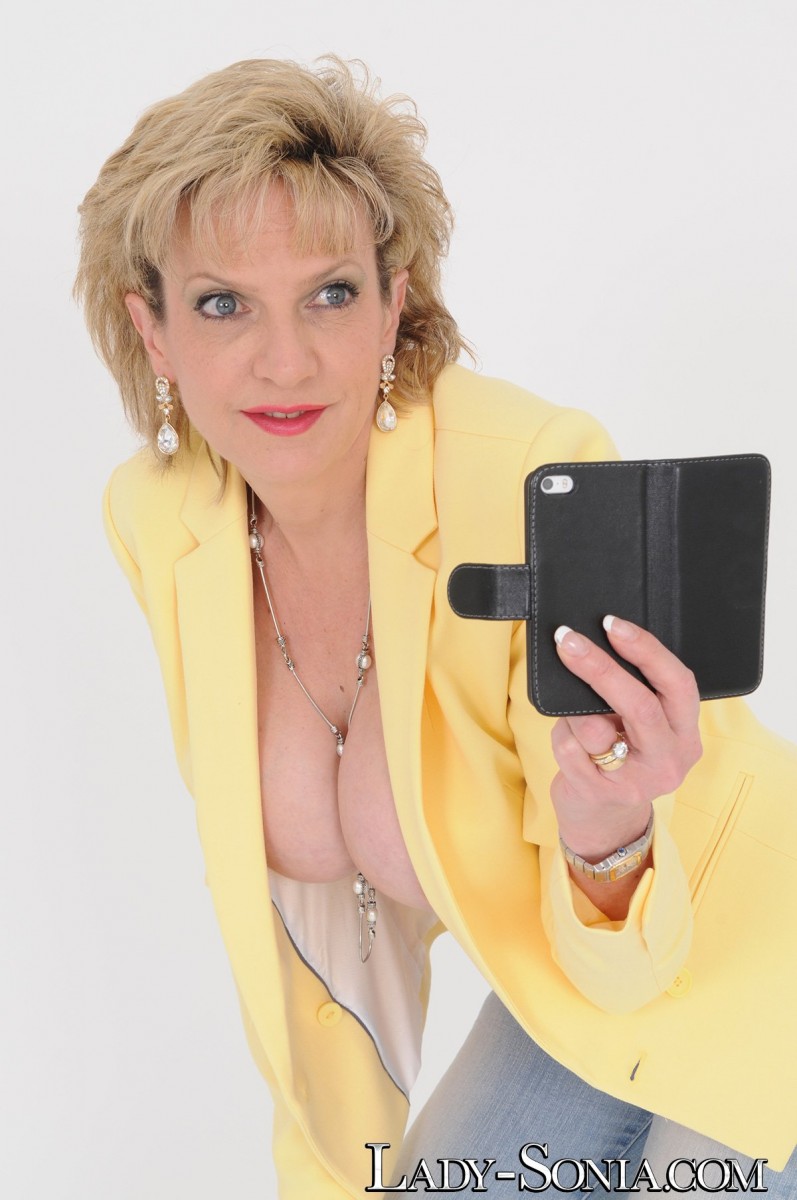 Older UK blonde Lady Sonia takes self shots of her enhanced boobs photo porno #425059853