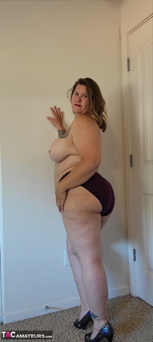 Obese amateur Busty Kris Ann strips down to her high-heeled shoes porn photo #422686455