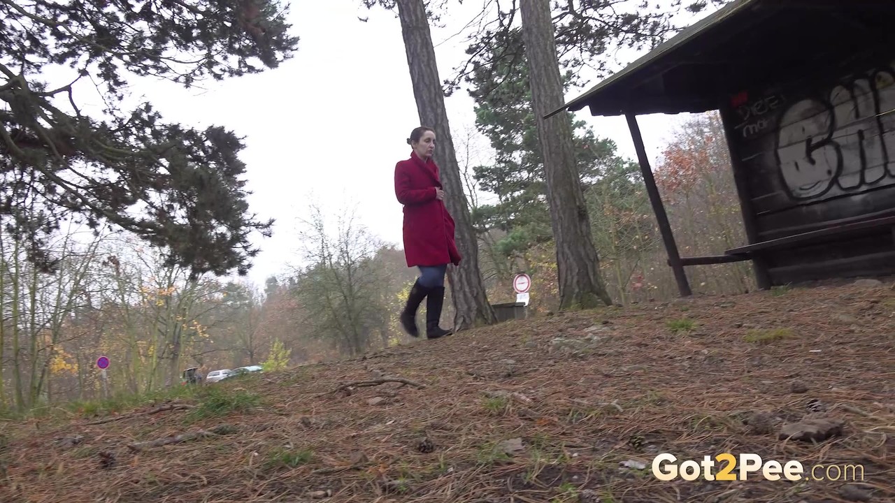 Caucasian girl Lora takes a piss near a warming shack in the woods порно фото #426921463