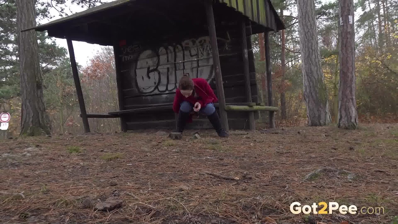 Caucasian girl Lora takes a piss near a warming shack in the woods porno foto #426921485