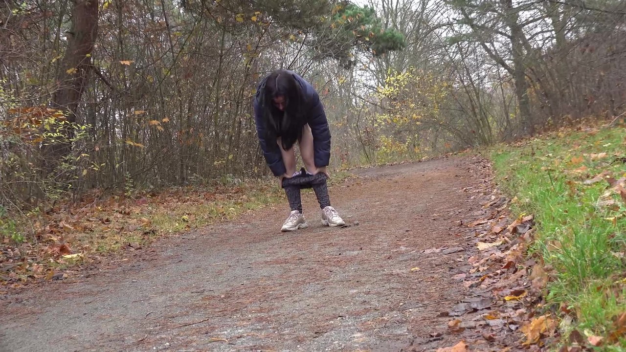 Brunette chick Helen takes a piss on a gravel path during a walk in the woods порно фото #428869327