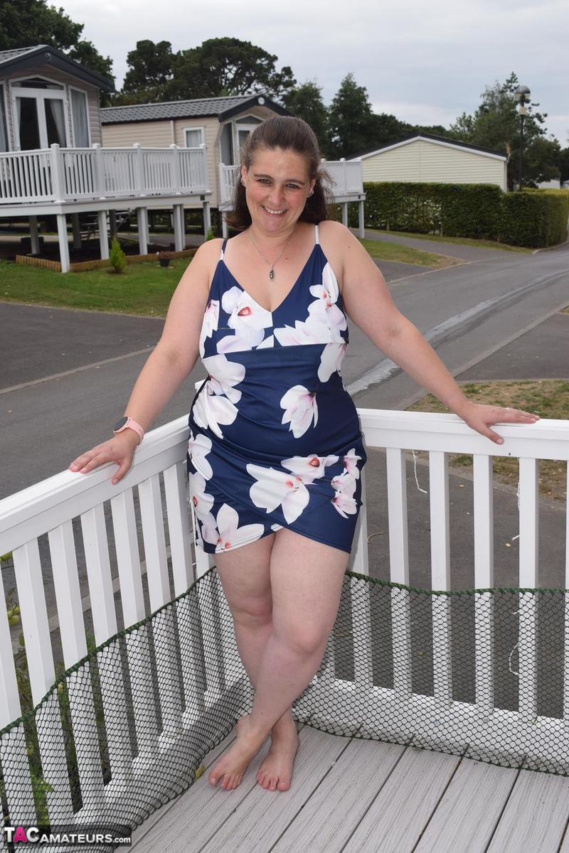 Middle-aged fatty exposes herself on a balcony in a public location porn photo #422607479