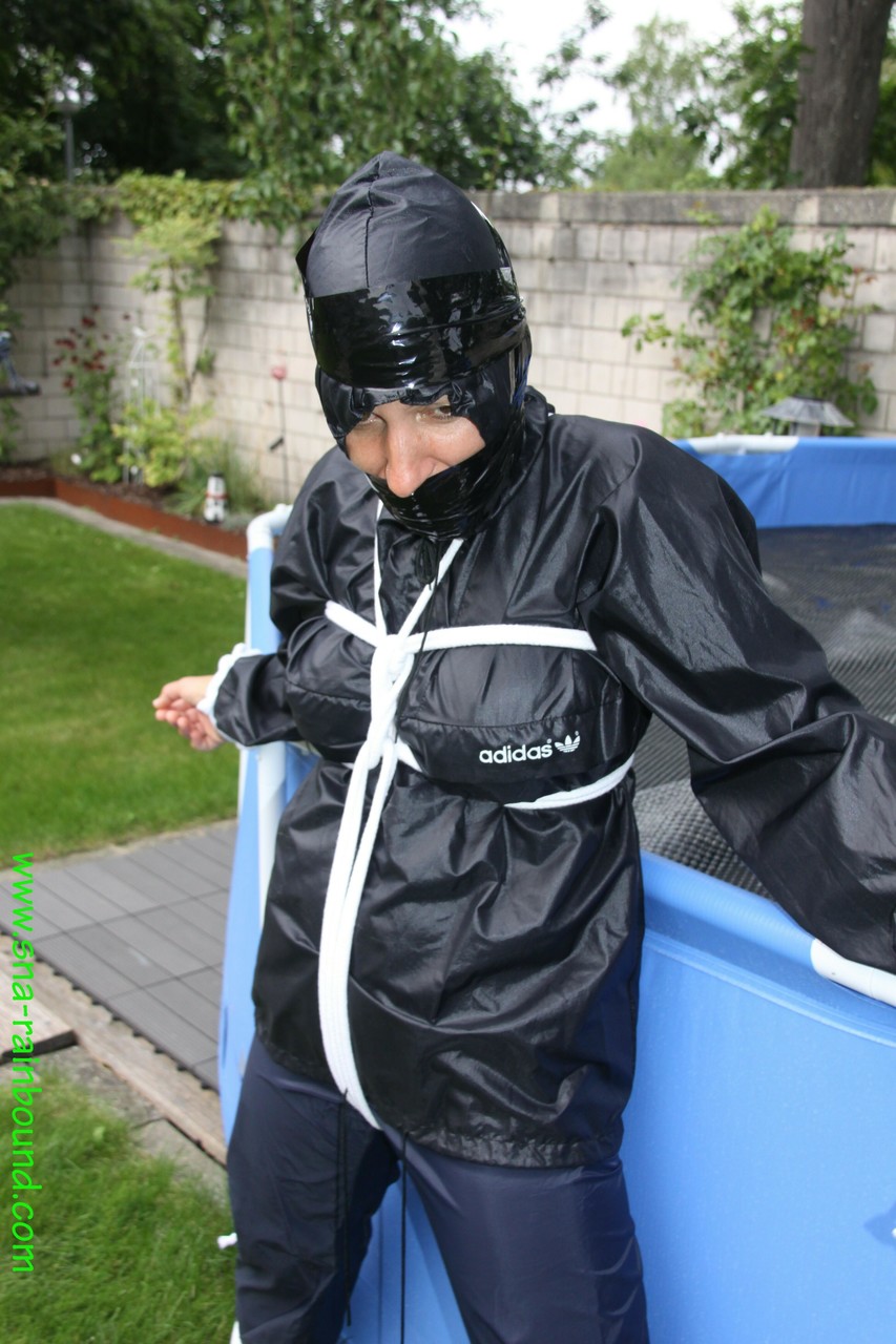 Amateur woman Sandra is gagged and tied to a pool in a raincoat porno fotoğrafı #425389817