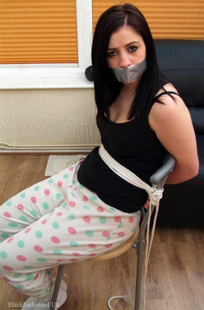 Brunette girl Randy Star is tied to a chair with duct tape over her mouth porn photo #422777300