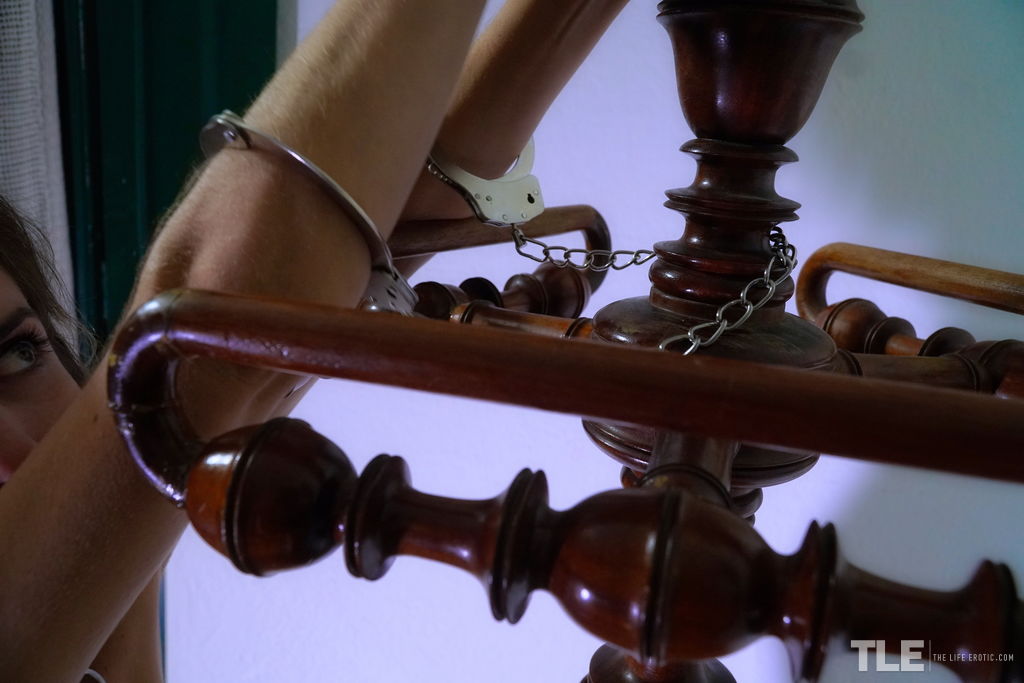 Handcuffed: This sexy blonde with hazel eyes, Shannon loves being naked and holding a coat stand.