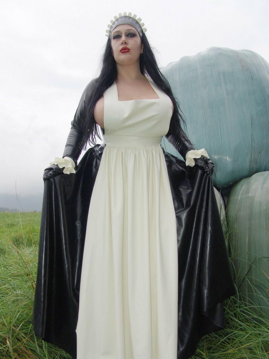 Goth woman Lady Angelina does her laundry outdoors in a tub in latex clothing porn photo #422510257 | Fetish Lady Angelina Pics, Lady Angelina, Maid, mobile porn