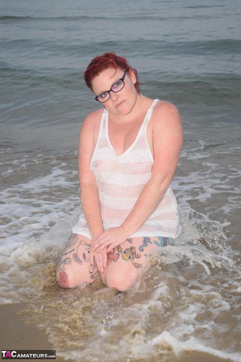 Mature redhead Mollie Foxxx wets her tattooed body in the ocean 포르노 사진 #428338790