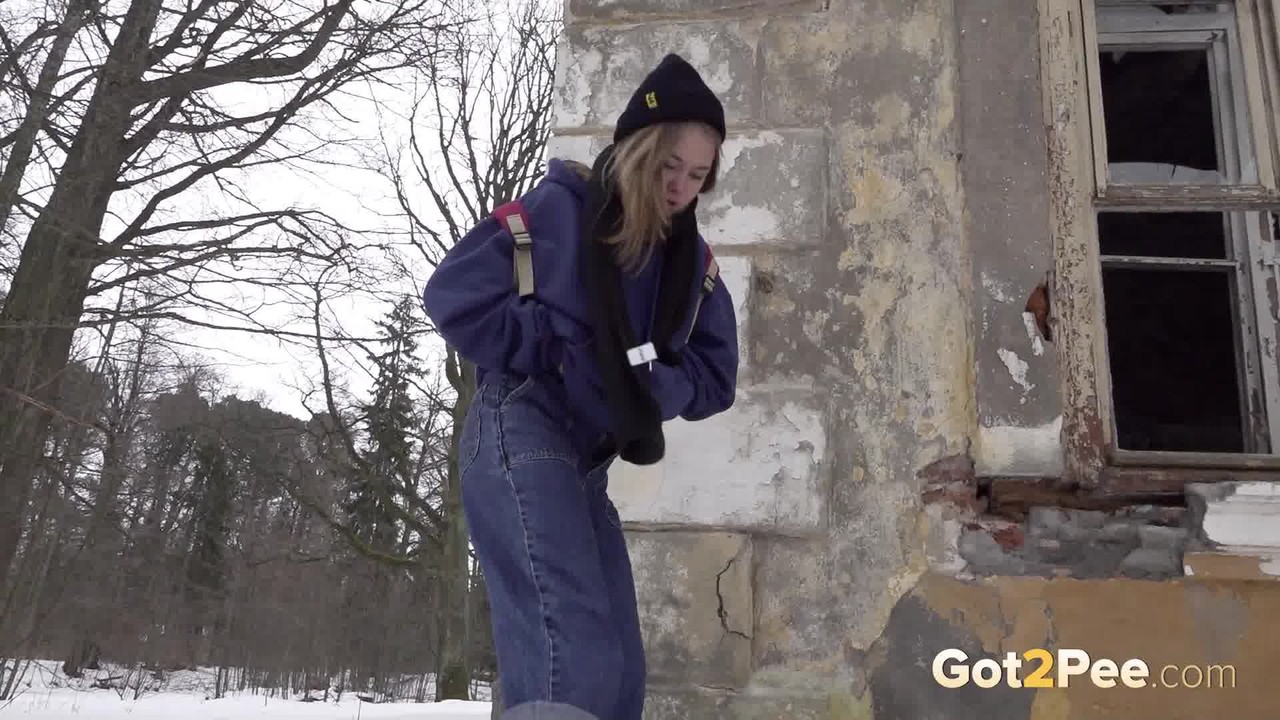 Cute blonde shakes as she pees over the snow порно фото #425533737
