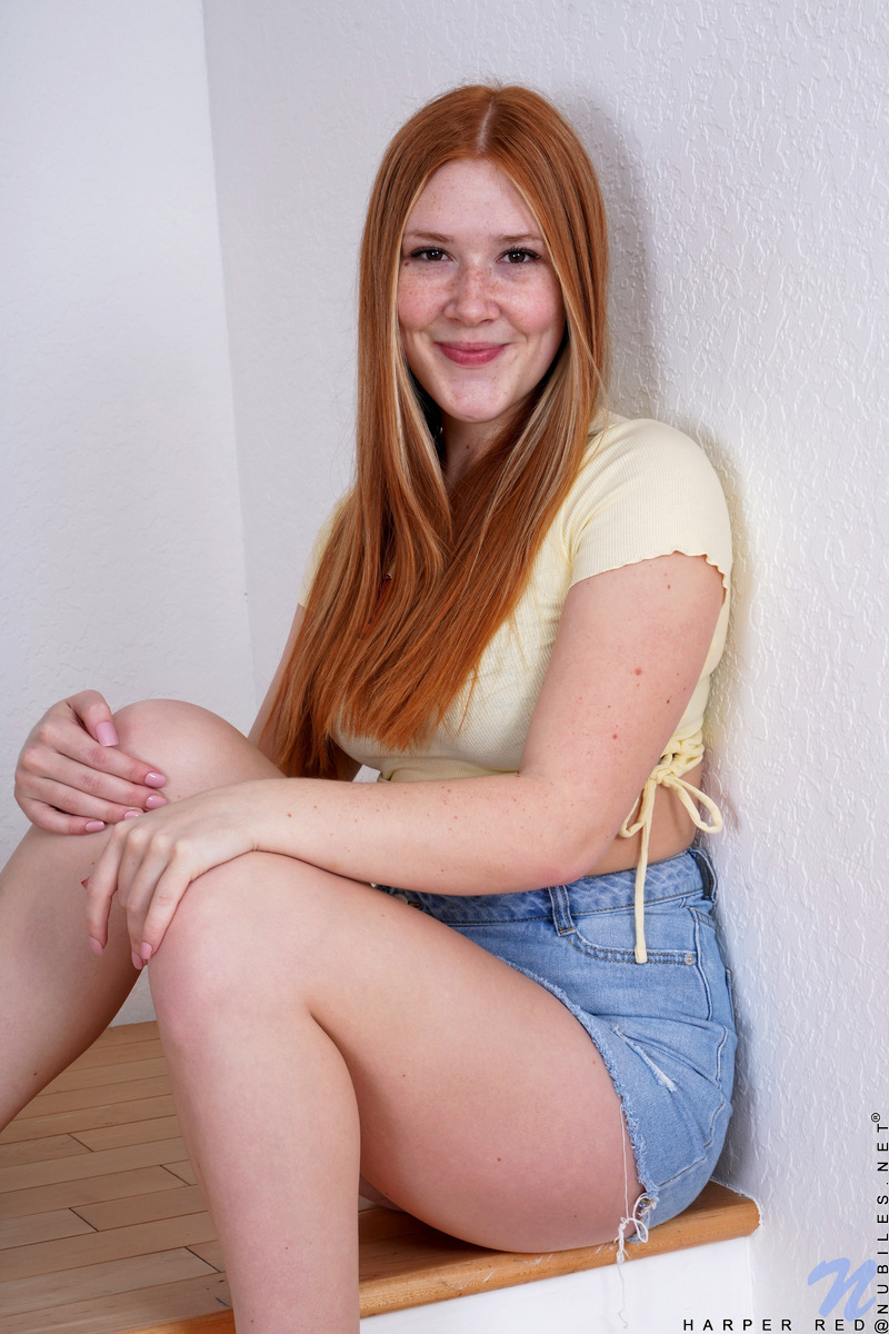 Young Redhead Harper Red Gets Naked On The Stairs While Wearing Sandals