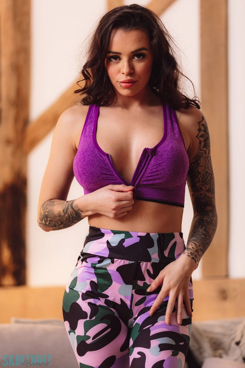 Hot brunette Mia Stryker unveils her big tits while removing leisurewear porno fotoğrafı #426607036