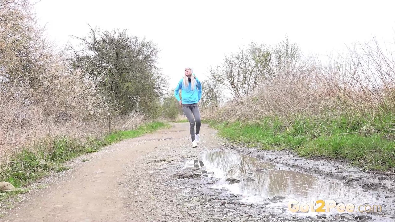 Blonde girl Mistica pees in a puddle on a dirt road through the countryside porn photo #425329043 | Got 2 Pee Pics, Mistica, Pissing, mobile porn