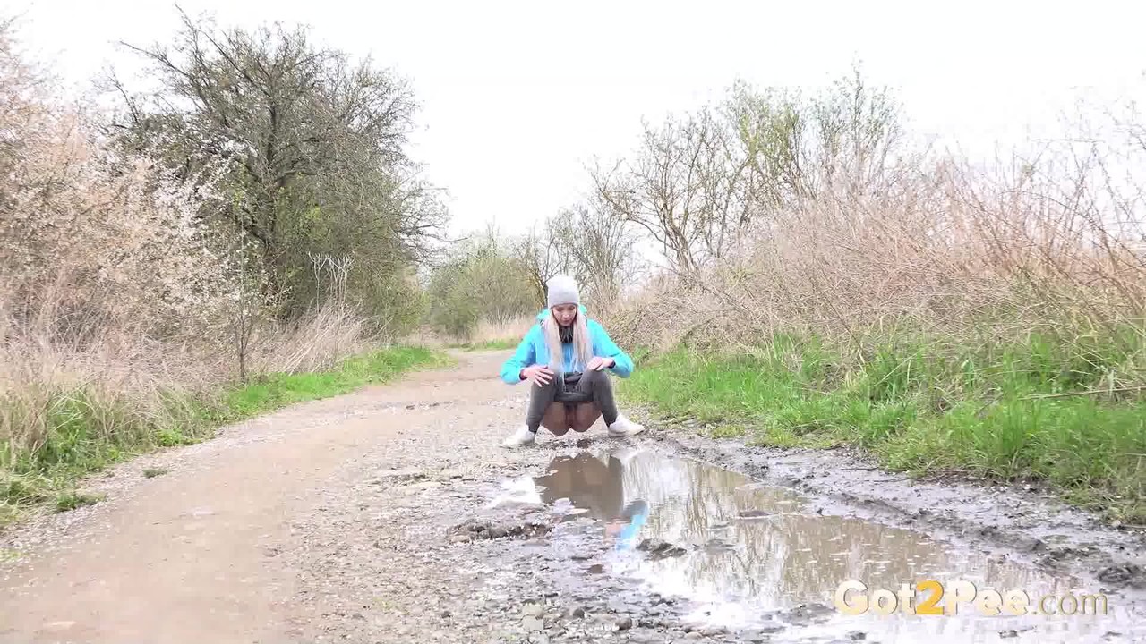 Blonde girl Mistica pees in a puddle on a dirt road through the countryside porn photo #425329065 | Got 2 Pee Pics, Mistica, Pissing, mobile porn