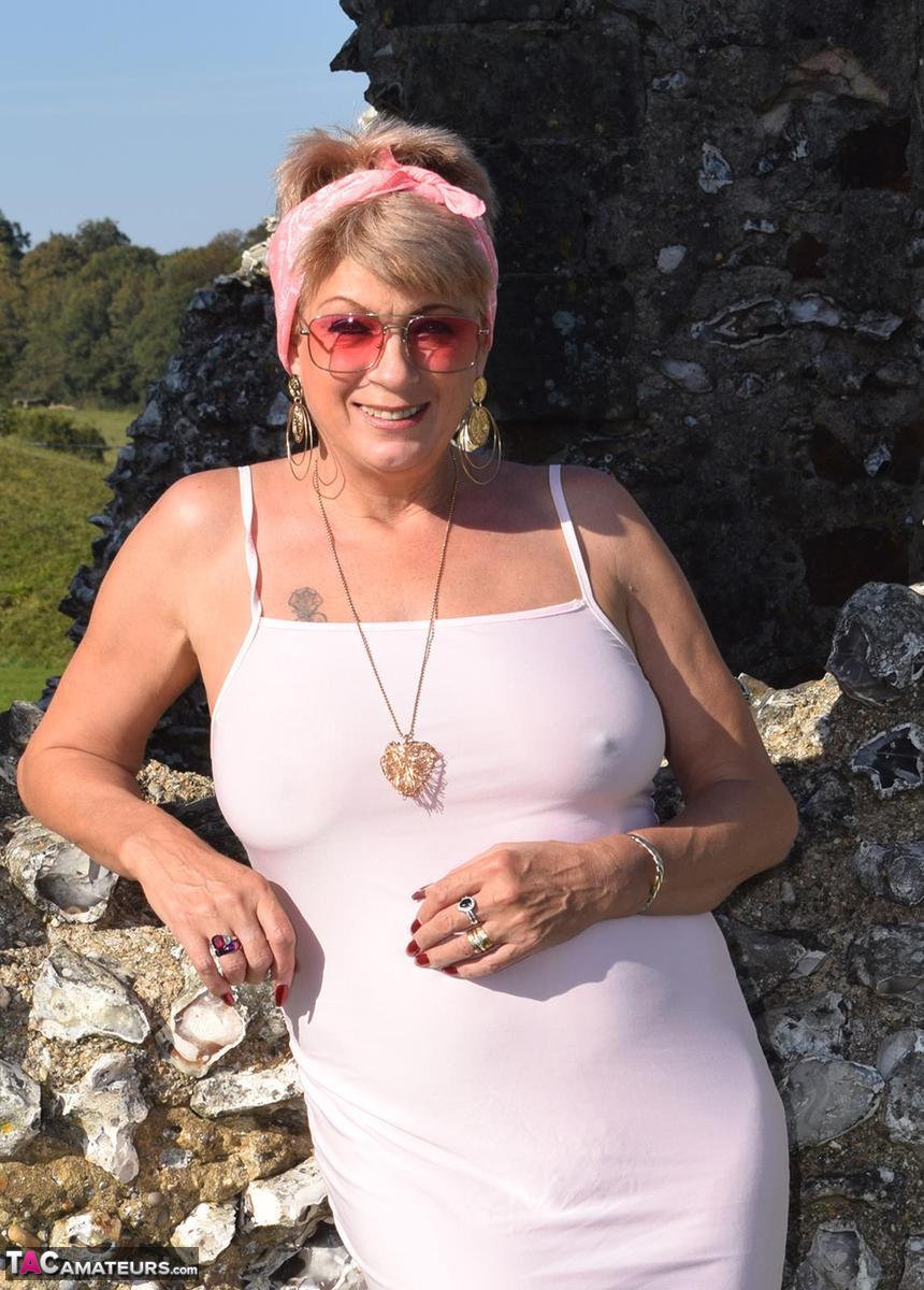 Mature lady Dimonty exposes her tits and pussy at a historical site porn photo #425290559