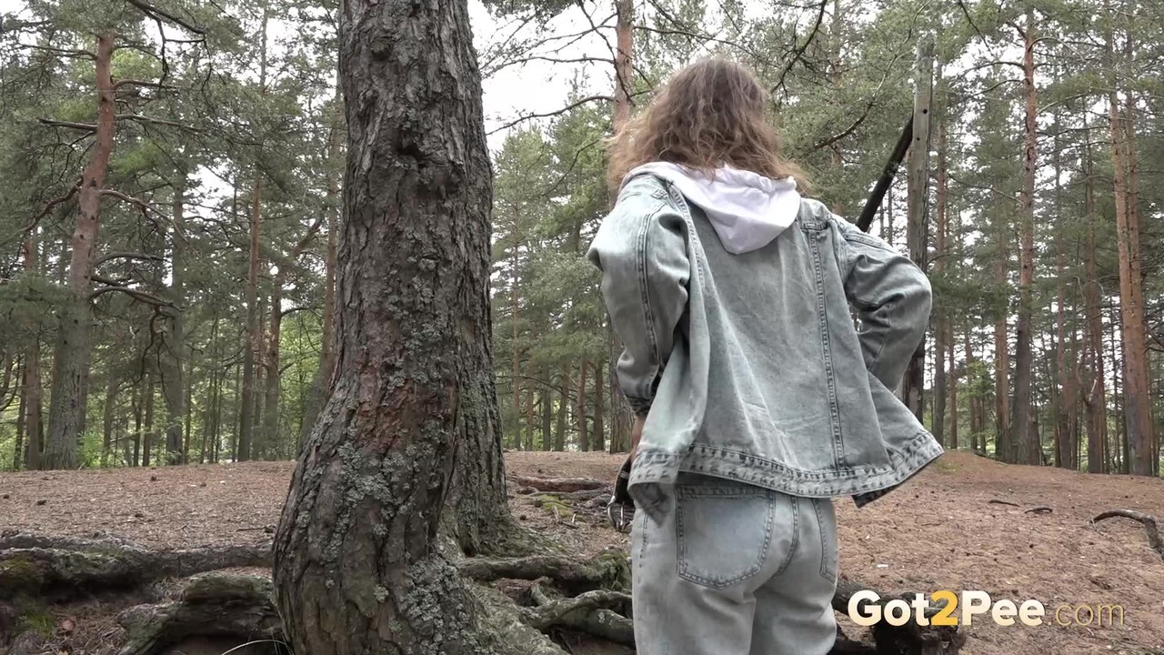European babe bends over to piss in woods порно фото #426408826