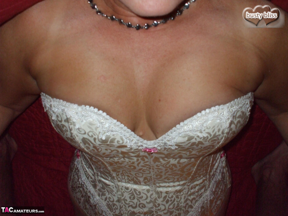 Older Amateur Busty Bliss Releases Her Big Natural Tits From A Laced Corset