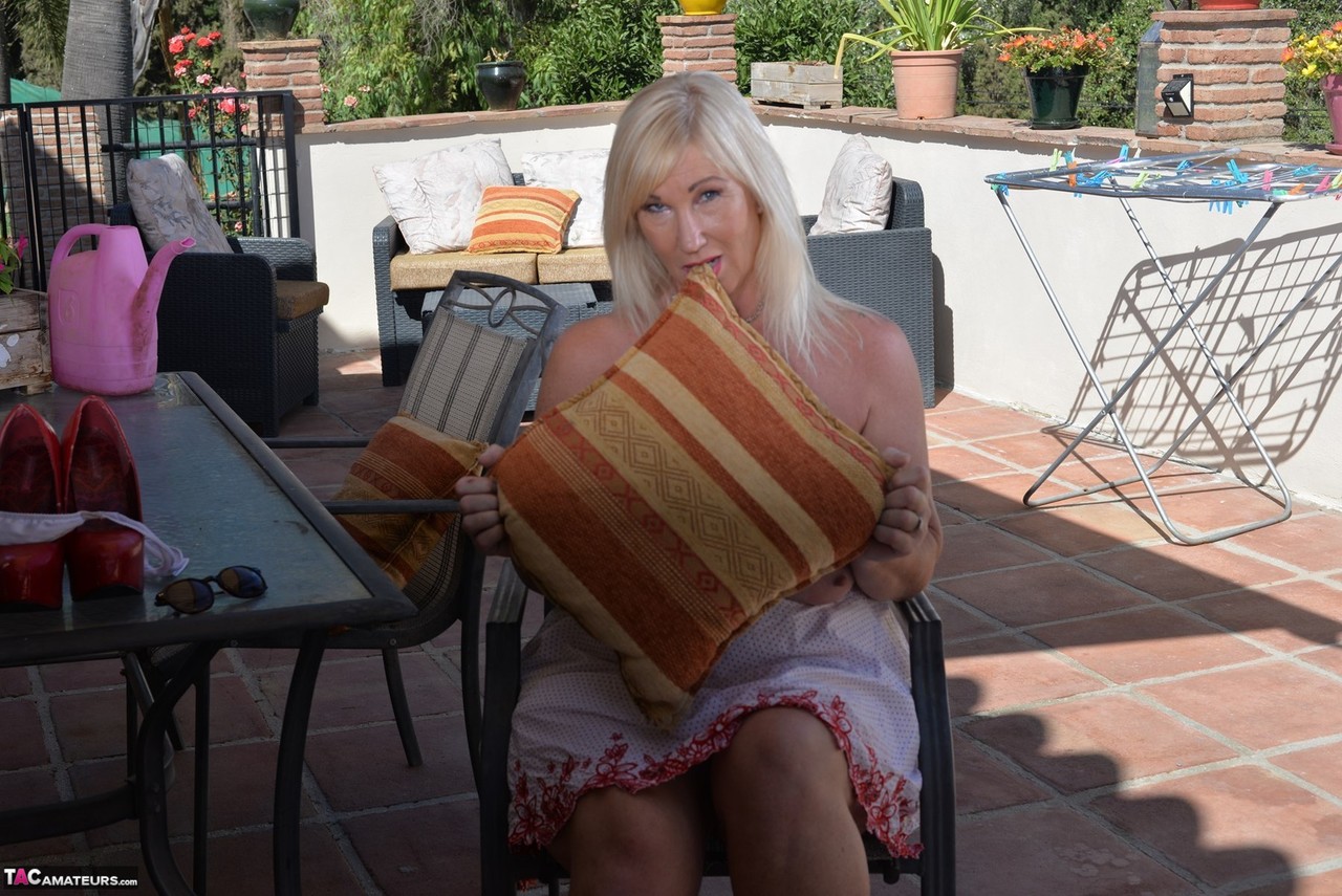 Overweight Mature Blonde Melody Shows Her Large Tits And Pussy On A Patio