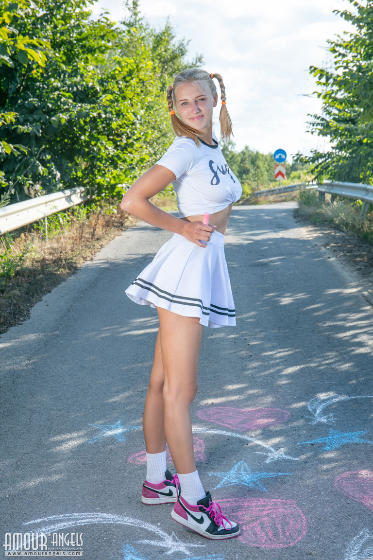 Blonde teen Nana strips to her socks and runners on a paved road porn photo #422473845