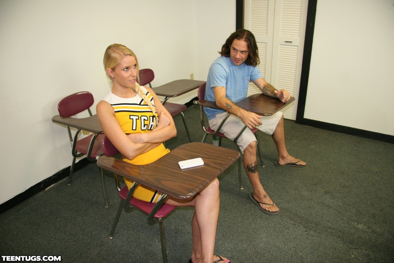 Blonde cheerleader Vanessa Cage gives a classmate an impromptu handjob porn photo #422763777