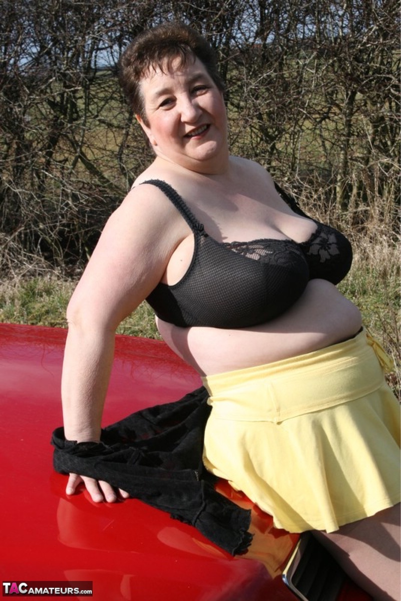 Older Uk Fatty Kinky Carol Takes Off Her Blouse While Wearing A Skirt And Hose