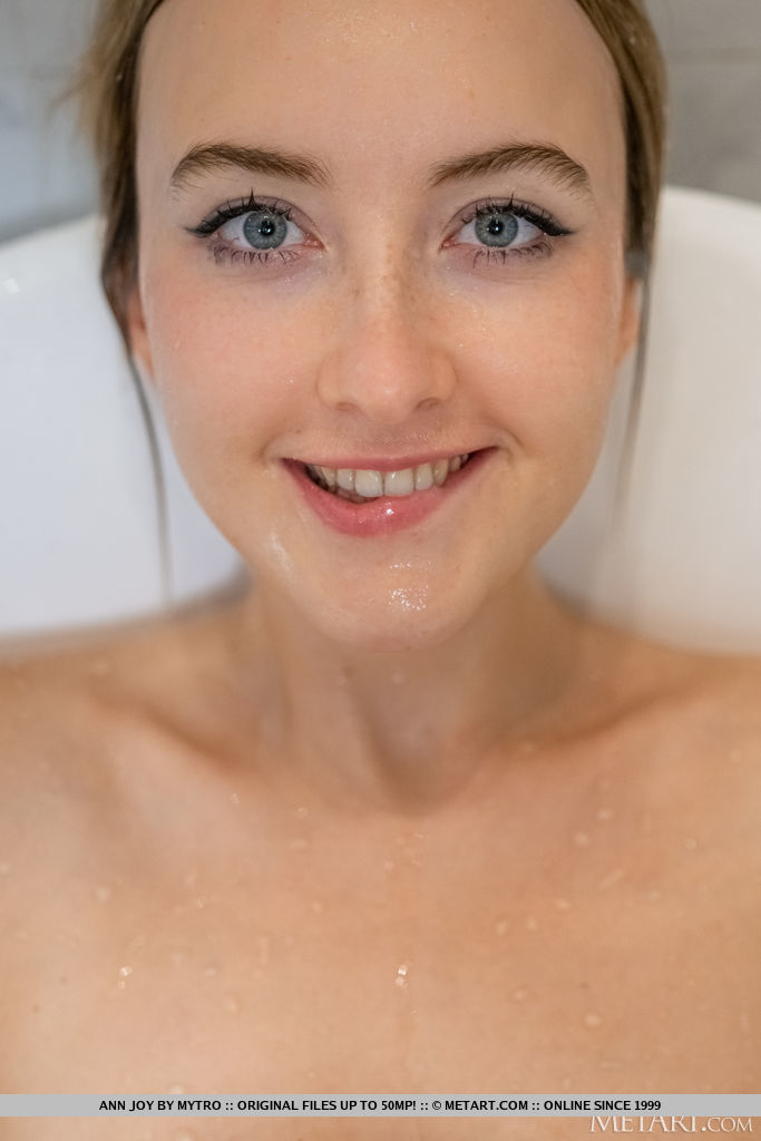 Blonde Teen Ann Joy Splashes Water On Her Natural Tits In A Bathtub