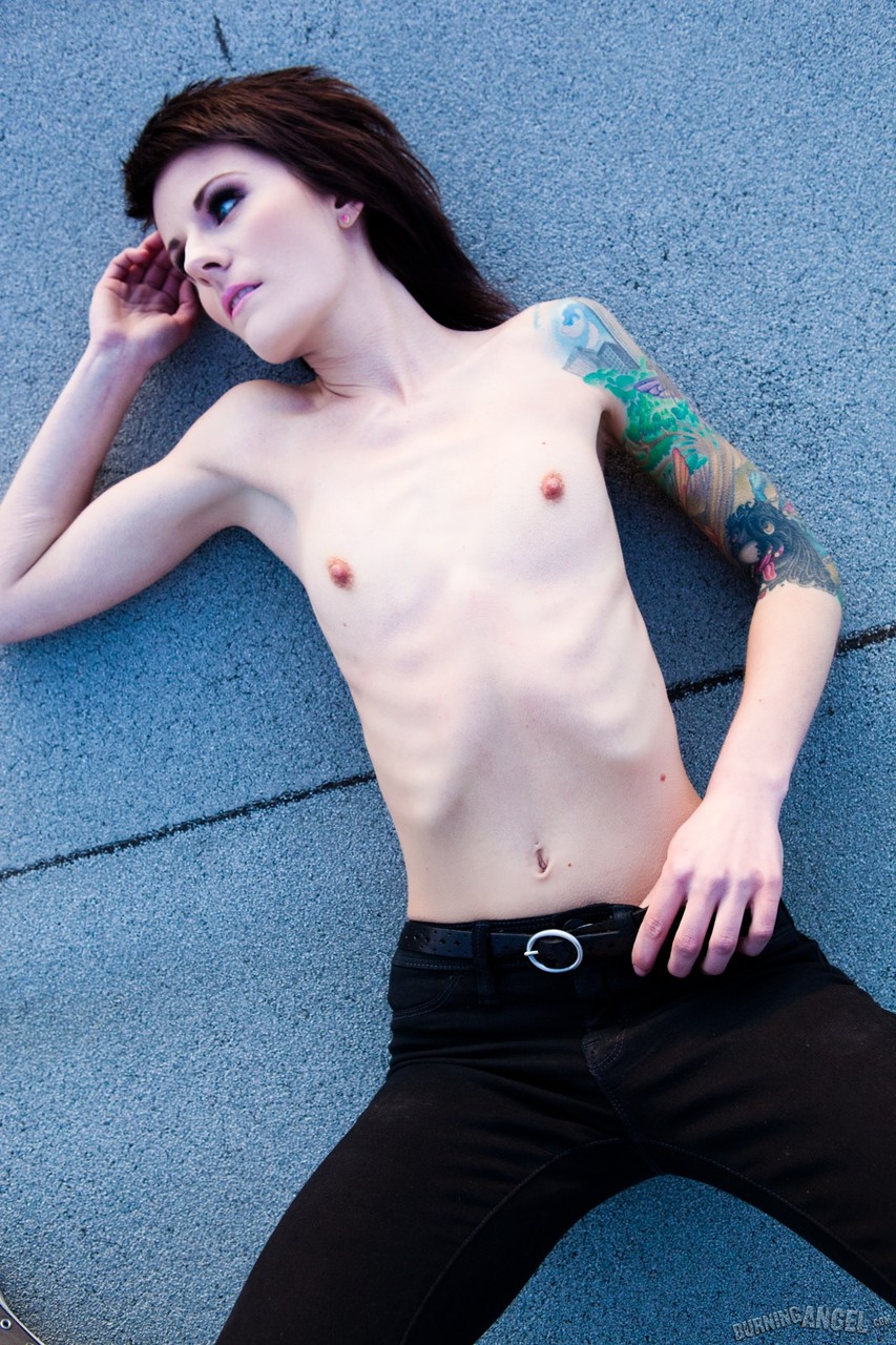 Skinny alt babe with tattooed body exposing tiny tits outdoors on rooftop porn photo #424124367