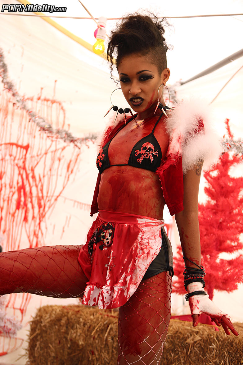 Ebony girl Skin Diamond wields a chainsaw before fucking a white guy in a tent porn photo #424867760