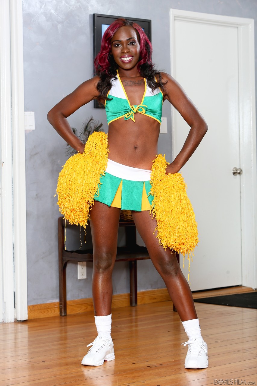 Slim ebony babe Bella Doll loves to preform in a cheerleader outfit porn photo #422983759