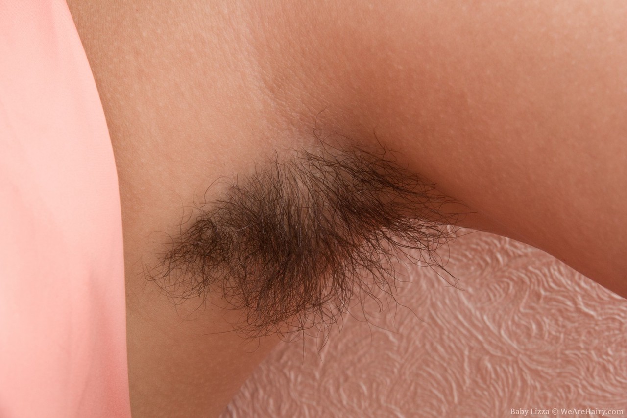 Petite teen Baby Lizza proudly exhibits hairy armpits and beaver porn photo #422810957